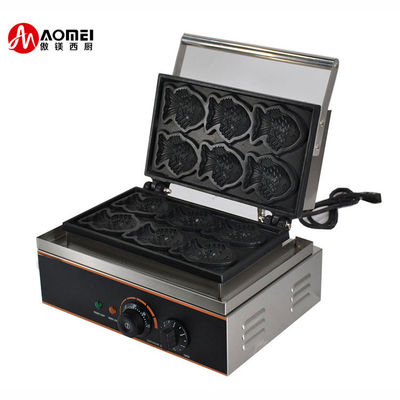 La machine à poisson taï-yaki multi-fonctionnelle fait des gaufres et des poissons en forme de bouche ouverte